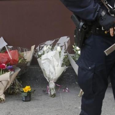 A policeman stands guard outside the Le Carillon restaurant the morning after a series of deadly attacks in Paris