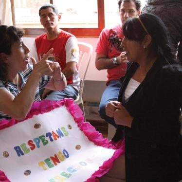 Using sign language, Monica, a deafblind woman, expresses her opinion on her right to political participation. She is a member of SENSE International Peru, an NGO working with deafblind people and their families.