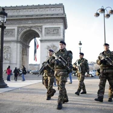 French soldiers patrol in front of the Arc de Triomphe on the Champs Elysees avenue in Paris, France