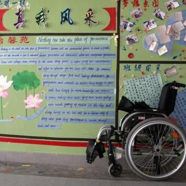 A wheelchair stands outside a classroom in the Beichuan Middle School in China's Sichuan province May 10, 2011.