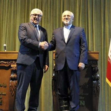 Iran's Foreign Minister Mohammad Javad Zarif shakes hand with his German counterpart Frank-Walter Steinmeier after a joint news conference in Tehran, Iran on October 17, 2015.