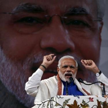 India's Prime Minister Narendra Modi addresses a rally in a cricket stadium in Srinagar, November 7, 2015.