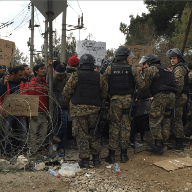 Asylum seekers and migrants protest in front of Macedonian police at Macedonia¹s refusal to allow people who are not Syrian, Afghan or Iraqi to enter the country from Greece. November 22, 2015