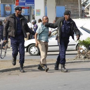 Riot police detain a demonstrator during nation-wide protests against a proposed change in the law that would delay elections. Goma, eastern Democratic Republic of Congo. January 19, 2015.