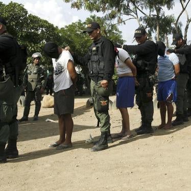 Venezuelan soldiers detain men who allegedly had links to a Colombian paramilitary group during an OLP raid in Táchira state, Venezuela  ©2015 Carlos Eduardo Ramirez/Reuters