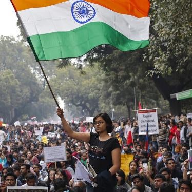 A demonstrator waves the Indian national flag during a protest on February 18, 2016, in New Delhi, India, demanding the release of Kanhaiya Kumar, a student union leader accused of sedition. In 2016 there has been a spike in the number of sedition cases f