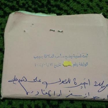 The order written on Amin’s expired residency papers: “Last chance to get ID or passport or to leave."