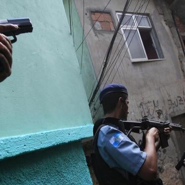 Policemen patrol the Rocinha favela in Rio de Janeiro on September 14, 2012. 