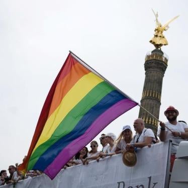 People dance in front of the Victory column as they participate in the annual Gay Pride parade, also called Christopher Street Day parade (CSD), in Berlin, Germany July 23, 2016.
