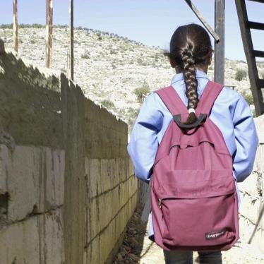 Bara’a, 10, originally from Ghouta, Syria, leaves for school from her informal refugee camp in Mount Lebanon.