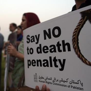 Activists from the Human Rights Commission of Pakistan (HRCP) carry placards during a demonstration in Islamabad, Pakistan on October 10, 2015.