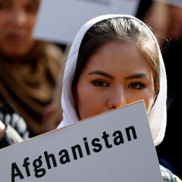 A demonstrator attends a rally outside the Brussels Conference on Afghanistan, Belgium, October 5, 2016.