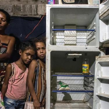 Leidy Cordova, 37, with four of her five children at their home in Cumana, Venezuela, June 16, 2016. Their broken refrigerator held the only food in the house: a bag of corn flour and a bottle of vinegar. 