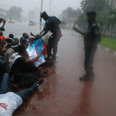 Police detain members of the youth movement Filimbi after a peaceful sit-in outside the African Union (AU) office in Kinshasa on October 29, 2016.