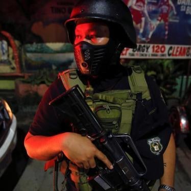 A member of the special police force takes position in Caloocan City, Metro Manila, Philippines early October 14, 2016.