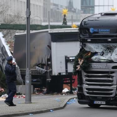 Police stand in front of the truck which plowed last night into a crowded Christmas market in the German capital Berlin, Germany, December 20, 2016.
