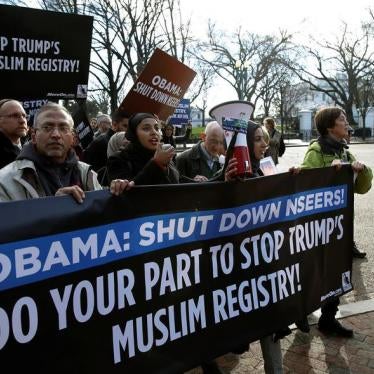 Protesters march past the White House during a protest to shut down the existing Muslim registry program NSEERS in Washington U.S., December 12, 2016.