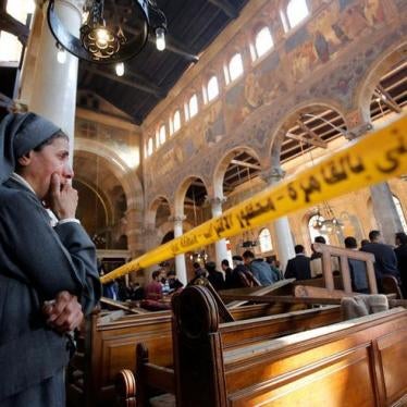 A nun cries inside Cairo's Coptic cathedral following a bombing on December 11, 2016. 