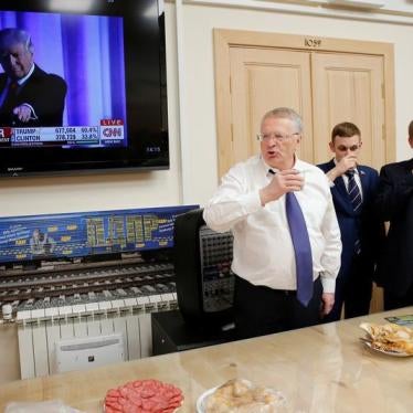 Head of the Liberal Democratic Party of Russia (LDPR) Vladimir Zhirinovsky celebrates Donald Trump's election as president by drinking sparkling wine with other party members during a break in the session of the State Duma