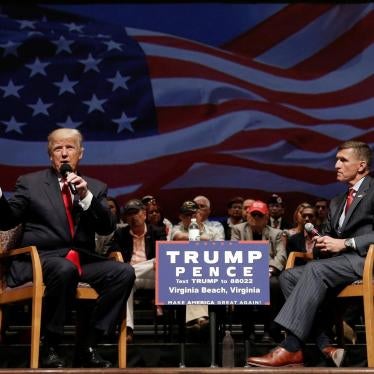 Donald Trump speaks alongside retired Lt. Gen. Mike Flynn during a campaign town hall meeting in Virginia, US, on September 6, 2016.