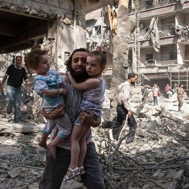 Syrian Man Carries Children After Barrel Bomb Attack