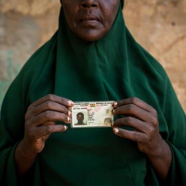 Zeinab Bulley Hussein holding the national identity card of her son, Abdi Bare Mohamed. Community members stumbled on Abdi Bare’s dead body 18 kilometers from Mandera, in northeastern Kenya, three weeks after police officers arrested him outside the famil