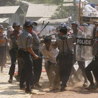 Police hit a student protester in Letpadan on March 10, 2015. 
