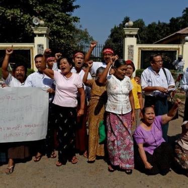 Released political prisoners shout for the release of other political prisoners in front of Insein prison in Rangoon, Burma on January 22, 2016.