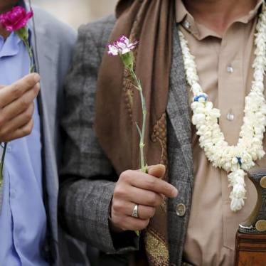 Members of the Baha’i faith demonstrate outside of a state security court in Sanaa, Yemen, April 2016 