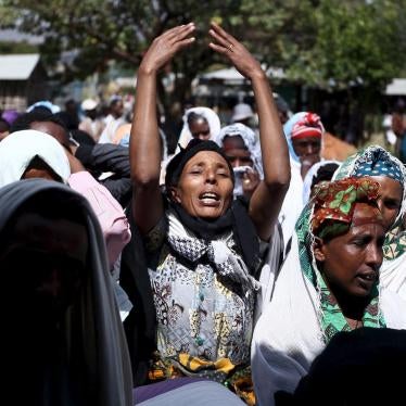 Women mourn during the funeral ceremony of Dinka Chala, a primary school teacher whom family members said was shot dead by military forces during a demonstration in Holonkomi town, Ethiopia on December 17, 2015. 