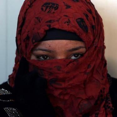 A Sunni Muslim woman who fled the Islamic State's strongholds. 