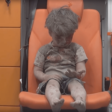 A still from video shows Omran, the 5-year old boy who was pulled out of the rubble after an airstrike in Aleppo, Syria on August 17, 2016. 
