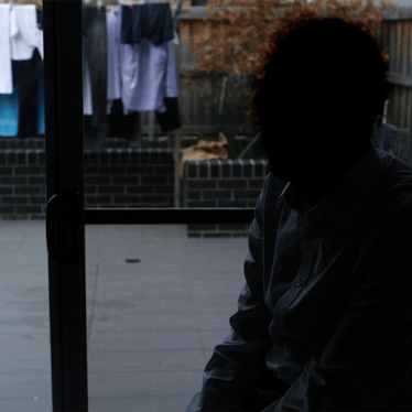 Somali-Ethiopian Australian who protested the visit of the Ethiopian government delegation to Australia.