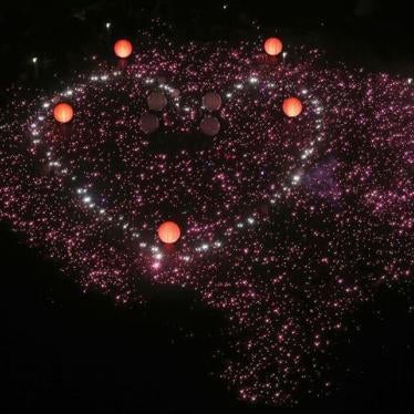 Participants form a giant pink dot at the Speakers' Corner in Hong Lim Park in Singapore on June 4, 2016. The annual Pink Dot festival promotes an acceptance of the Lesbian, Gay, Bisexual and Transgender (LGBT) community in Singapore. 