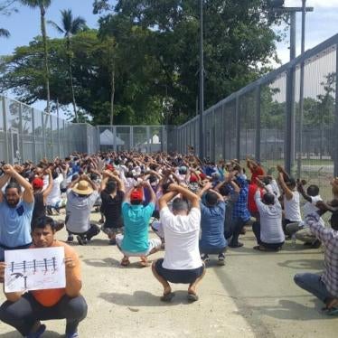 Refugees and asylum seekers protest against Australia’s offshore processing policy at a detention center on Manus Island, Papua New Guinea.