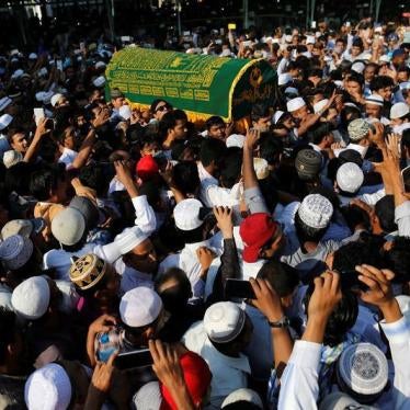 Supporters carry the coffin of U Ko Ni after he was shot and killed in Rangoon, Burma on January 30, 2017.
