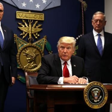 U.S. President Donald Trump signs an executive order to impose tighter vetting of travelers entering the United States, at the Pentagon in Washington, U.S., January 27, 2017.
