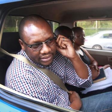 Zimbabwean pastor Evan Mawarire speaks on the mobile phone upon his release from Chikurubi Maximum Prison in Harare, Zimbabwe, February 9,2017.