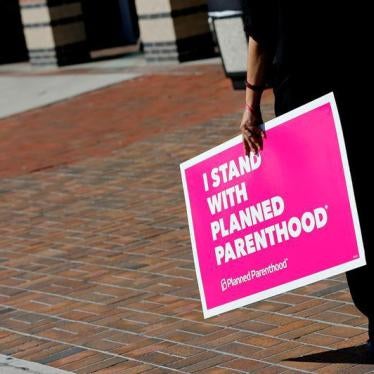 A sign in support of Planned Parenthood is seen outside a town hall meeting for Republican U.S. Senator Bill Cassidy in Metairie, Louisiana, U.S. February 22, 2017.