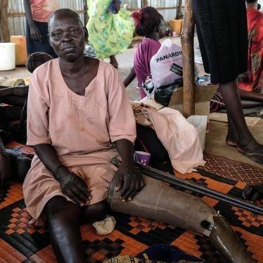 2)	Nyayak Olo Bapit, a Shilluk woman from Malakal, pictured in Juba. She was forced to flee Malakal after a bullet struck her left thigh during fighting there in January 2014.     