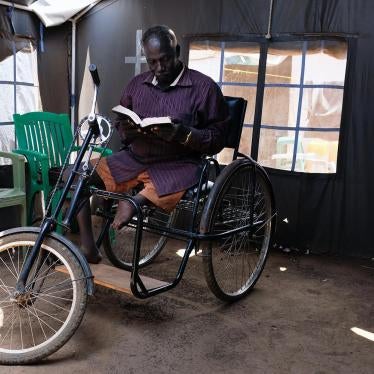 John Biel Dup, a former civil servant from Nassir, reads a book in the Juba Protection of Civilians 3. 