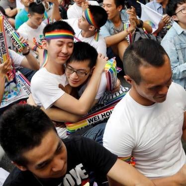 Supporters hug each other during a rally after Taiwan's constitutional court ruled that same-sex couples have the right to legally marry, the first such ruling in Asia, in Taipei, Taiwan May 24, 2017.