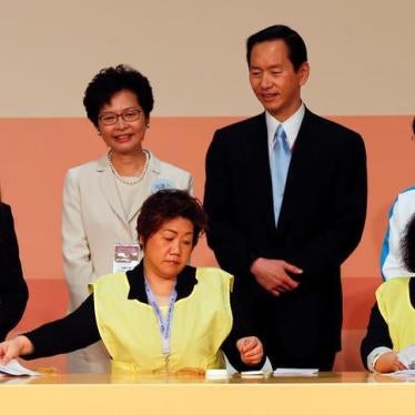 Carrie Lam smiles as officials count votes during the election for Hong Kong’s next chief executive on March 26, 2017.