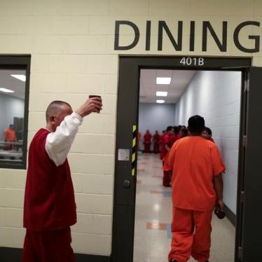ICE detainees walk into the dining area for lunch at the Adelanto immigration detention center, which is run by the Geo Group Inc (GEO.N), in Adelanto, California.