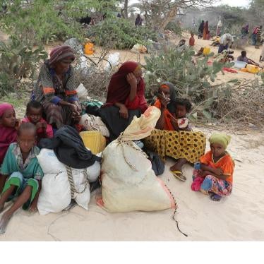 Somali families rest as they flee from drought-stricken Lower Shabelle region before entering makeshift camps in Somalia's capital, Mogadishu, joining the thousands already displaced, March 17, 2017. Al-Shabab forces attacked villages in Lower Shabelle re
