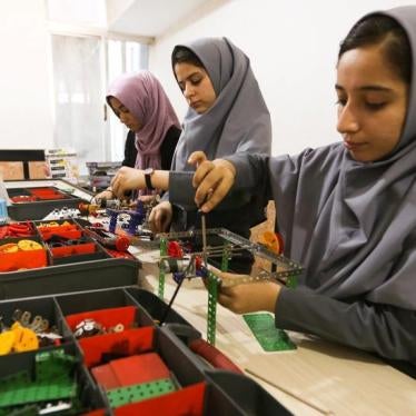Members of Afghan robotics girls team which was denied entry into the United States for a competition, work on their robots in Herat province, Afghanistan July 4, 2017.