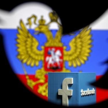 A photo illustration interweaving the Russian flag with the Facebook and Twitter logos taken in Zenica, Bosnia and Herzegovina, May 22, 2015. Russia's media watchdog has warned that Google, Twitter and Facebook could be blocked if they do not comply with 