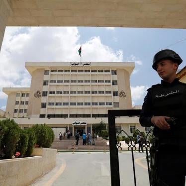 A Jordanian police officer stands guard in front of the parliament in Amman, Jordan May 29, 2016.
