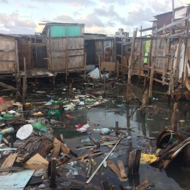 Wastewater and garbage are dumped directly into the river in a slum in the Coelhos neighborhood of Recife, Pernambuco state.