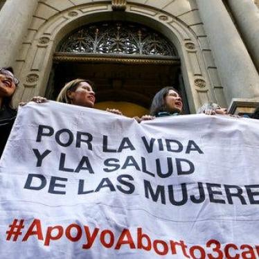 Pro-abortion activist take part in a demonstration in front of the Constitutional Court where opposing parliamentarians presented arguments against the newly approved law that allows abortions under limited circumstances, in Santiago, Chile. 